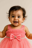 Pink Net Party Wear Frock With Bow Accent For Girls