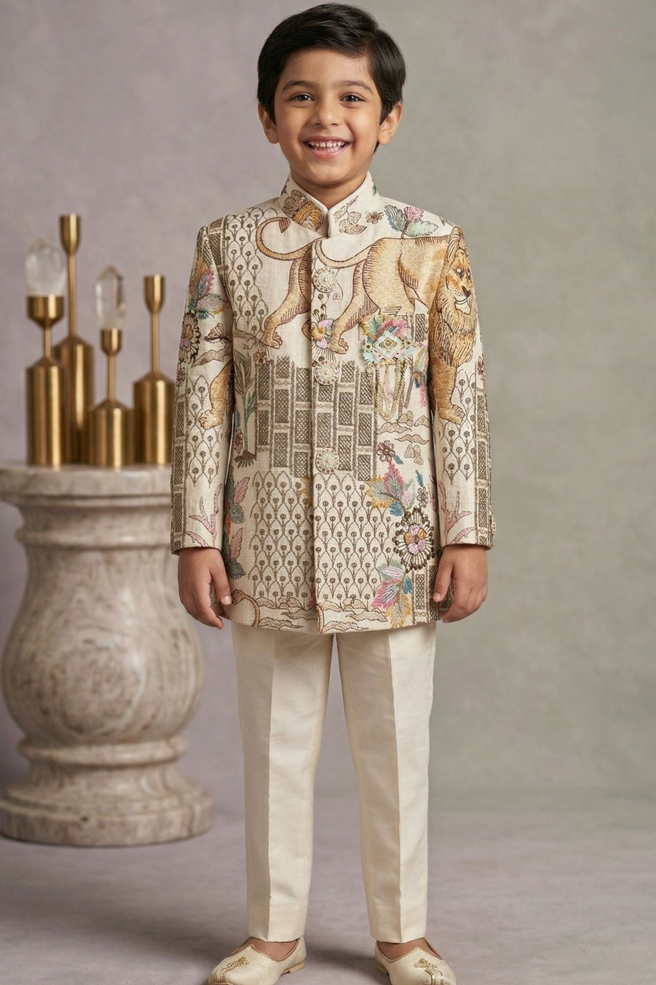 Cream Printed Jodhpuri Suit With Lion Motif And Embroidered Detailing For Boys