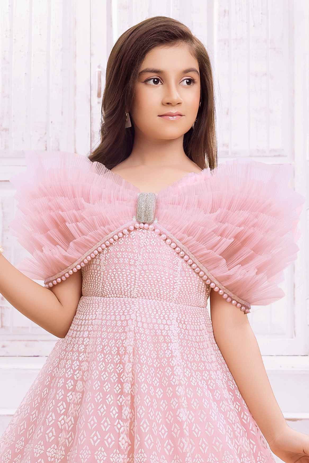 Designer Peach Shimmer Printed Party Wear Gown With Pearl Work For Girls