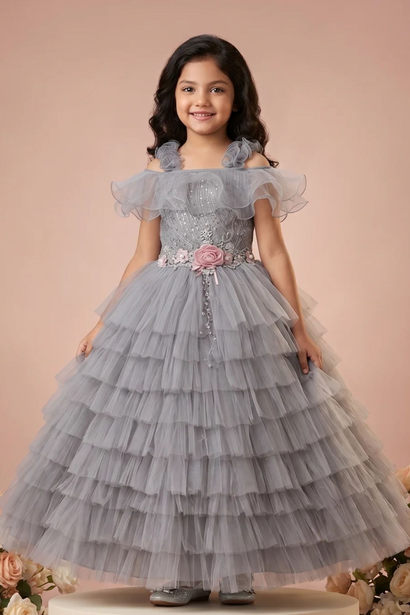 Girls Grey Layered Net Party Wear Gown with Off-Shoulder Ruffle Detailing
