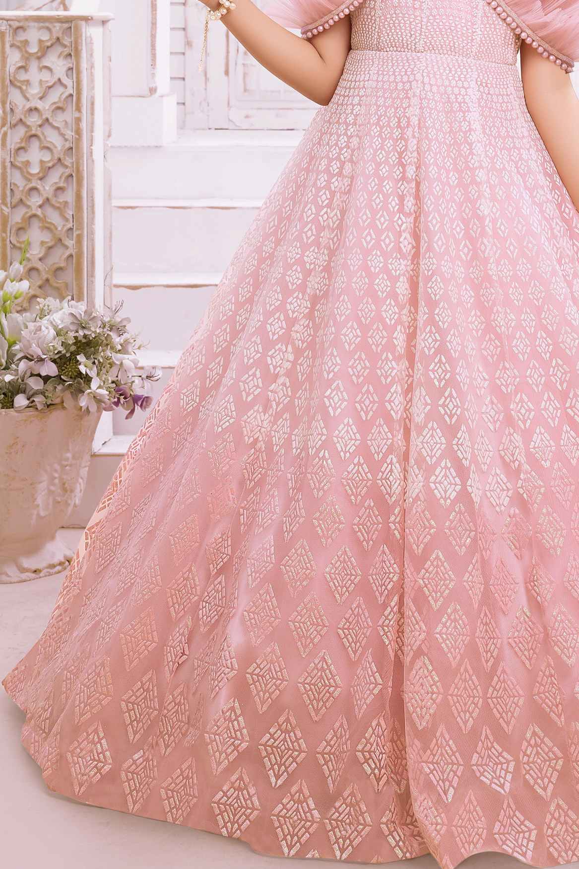 Designer Peach Shimmer Printed Party Wear Gown With Pearl Work For Girls