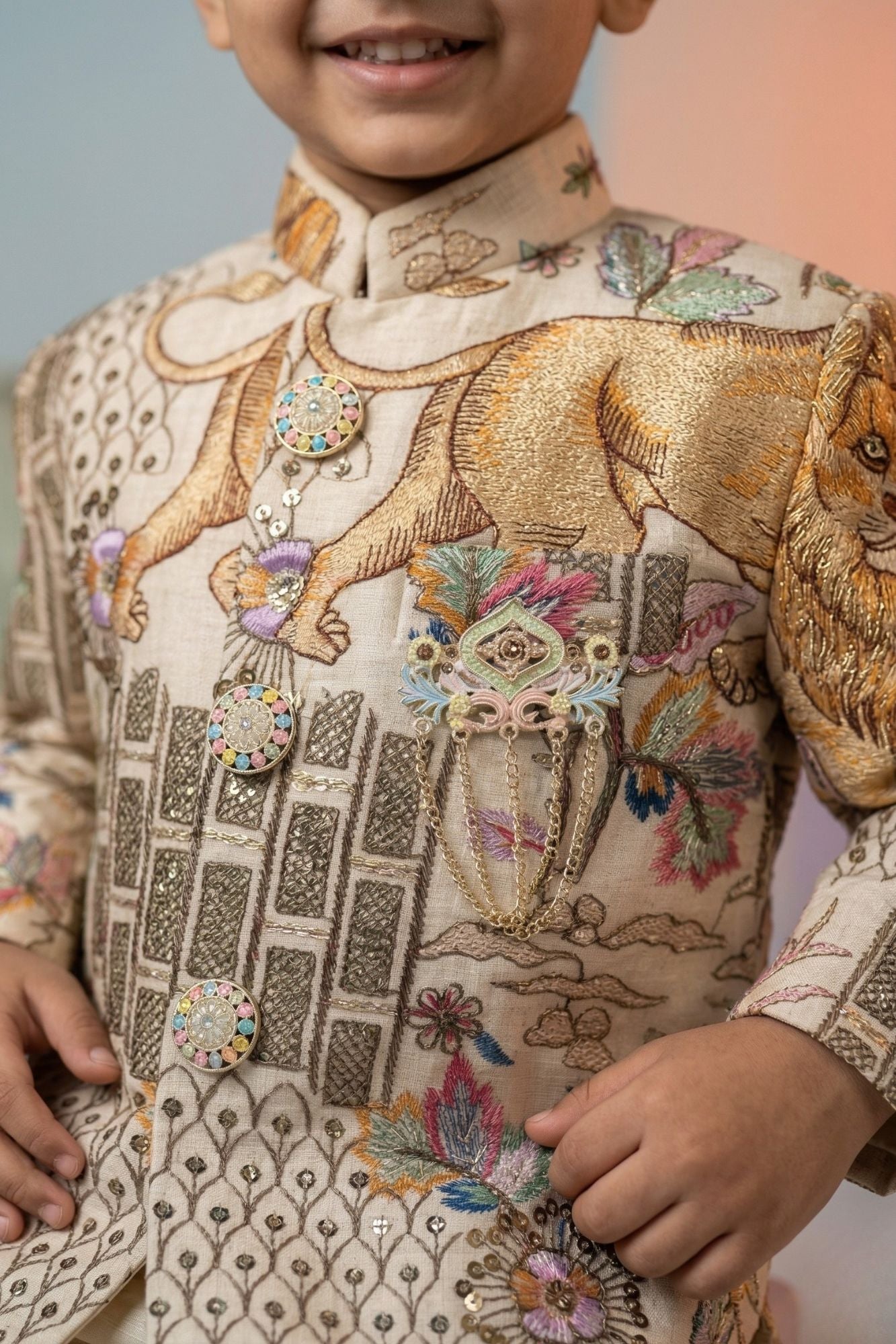 Cream Printed Jodhpuri Suit With Lion Motif And Embroidered Detailing For Boys