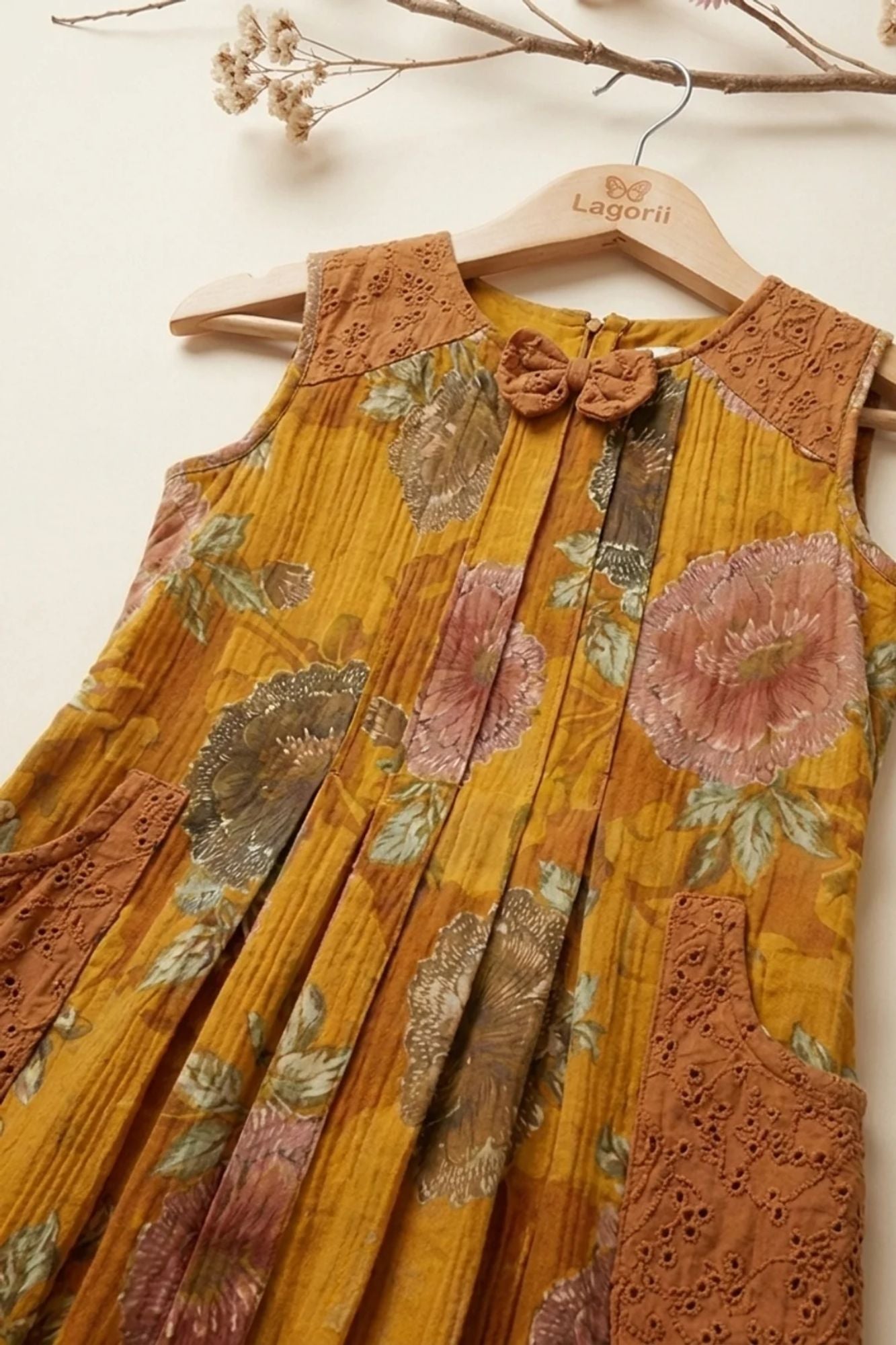 Girls Mustard Floral Printed Dress With Lace Panels and Pleats
