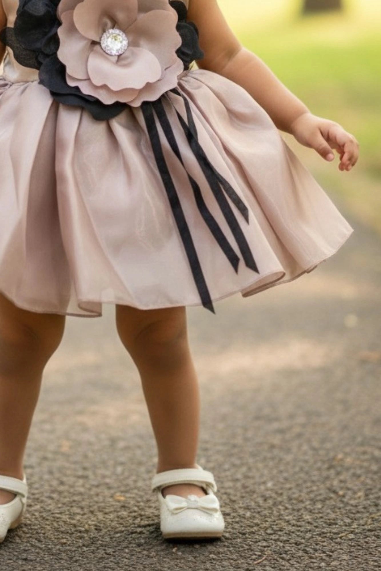 Brown Party Wear Frock with Oversized Black & Grey Floral Appliqué For Girls