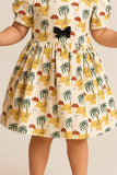 Beige Tropical Print Cotton Frock With Puff Sleeves & Bow Detail For Girls