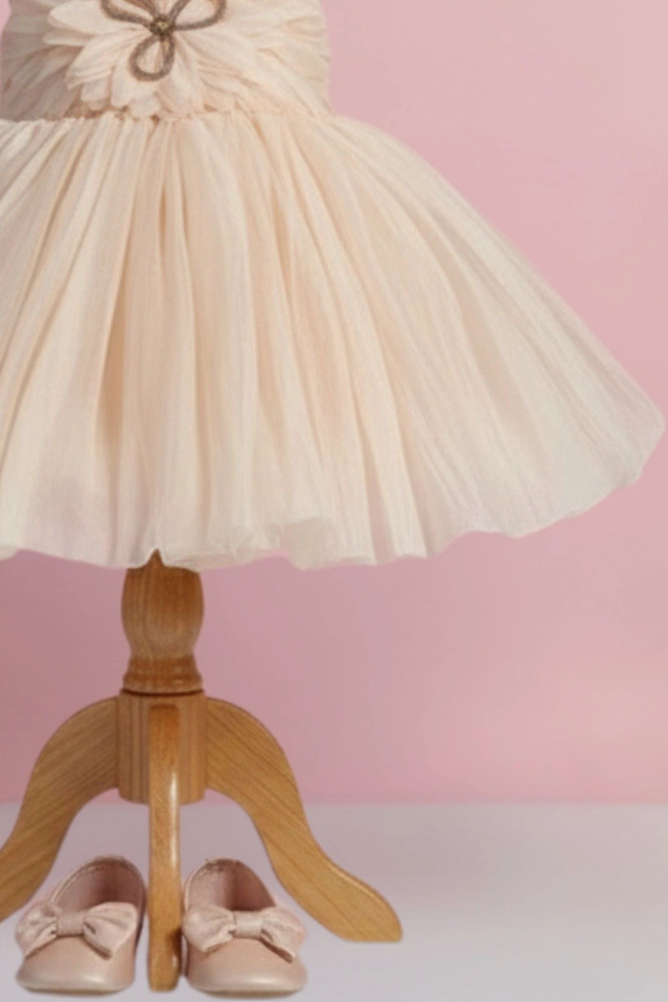 Fawn Party Frock with Oversized Floral Appliqué and Pleated Shine Finish For Girls