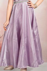 Designer Lavender Satin Gown With Stone Waist Band For Girls