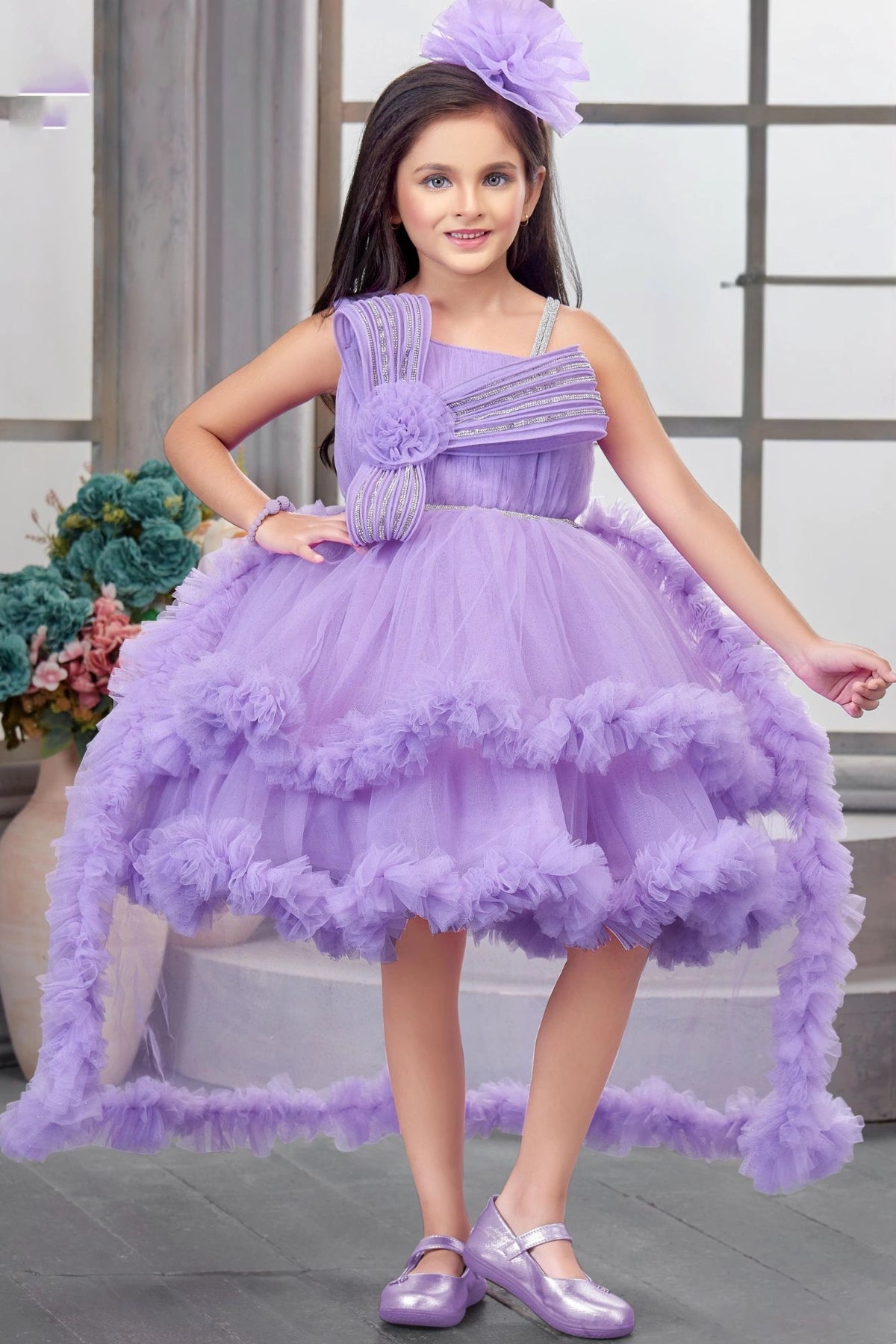 Lavender Layered Ruffle Party Frock With Tailbacl For Girls