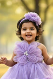 Lavender Embellished Party Wear Frock with 3D Floral Appliqué With Tailback For Girls