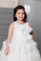 White Sequin Net Party Wear Gown Embellished With Bow For Girls