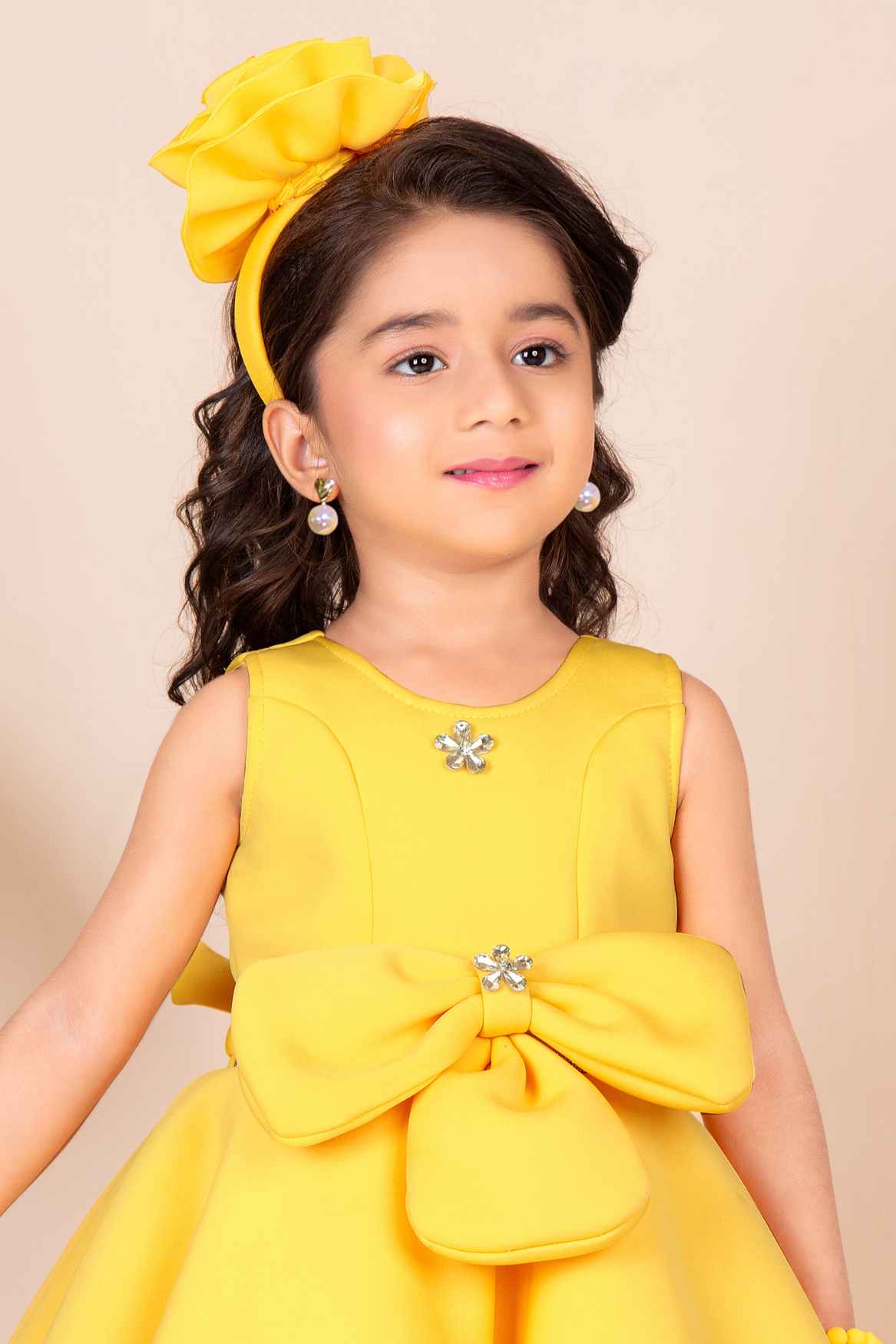 Lemon Yellow Sleeveless And Floral Embellishment Gown For Girls