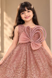 Peach Frock With Bow Embellished And Shimmer Printed For Girls