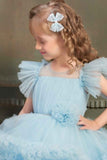 Ruffle Blue Multi-Layered Party Wear Frock With Flower Embellishment For Girls