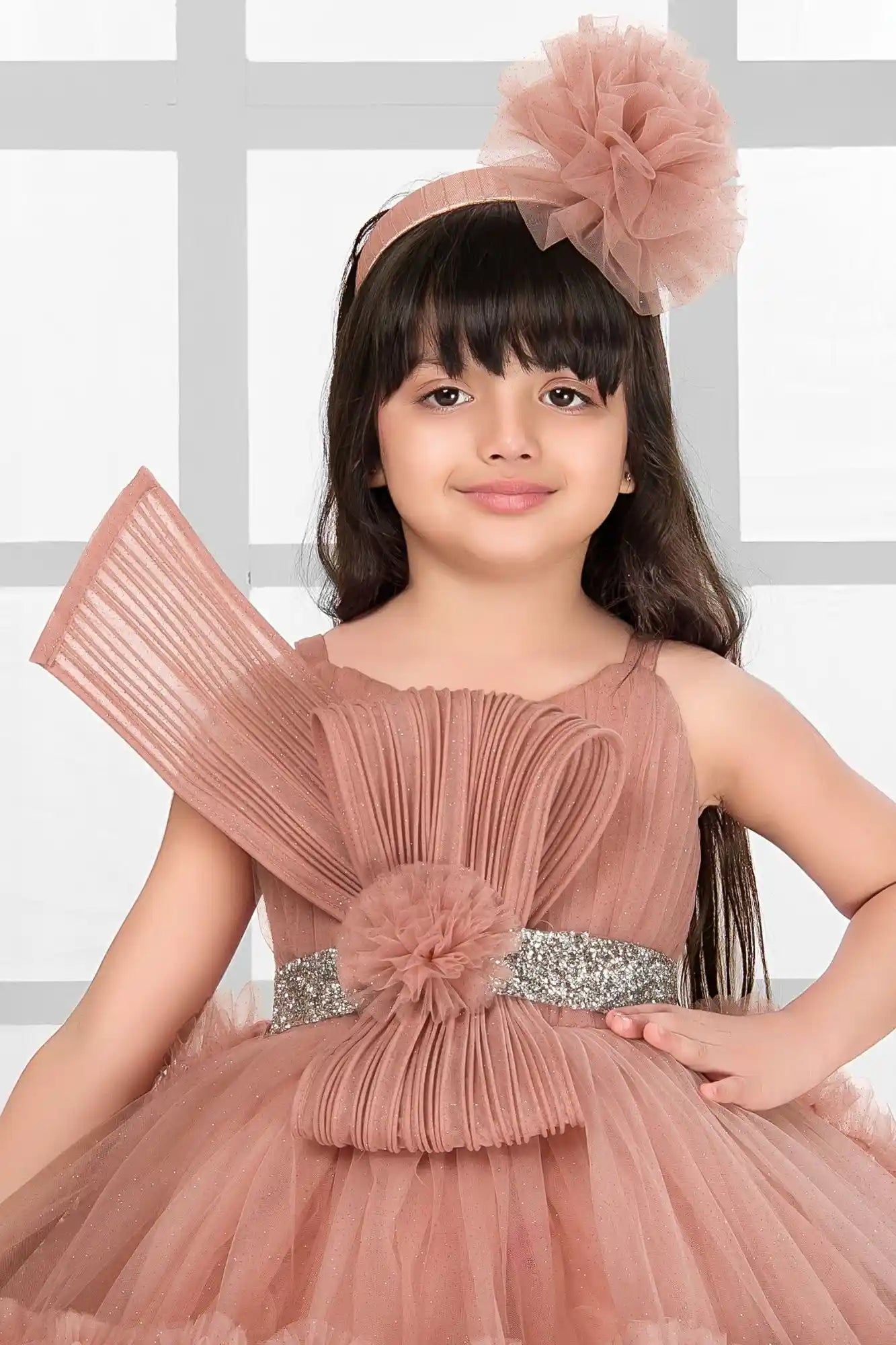 Dusty Pink Shimmer Party Gown with Dramatic Ruffles And Bow Accent For Girls