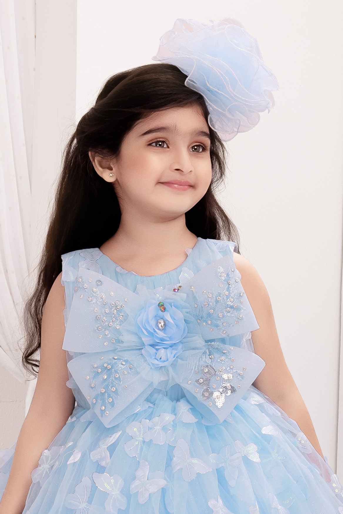 Sky Blue Floral And Butterfly Embellished With Sequins Work Party Wear Gown For Girls