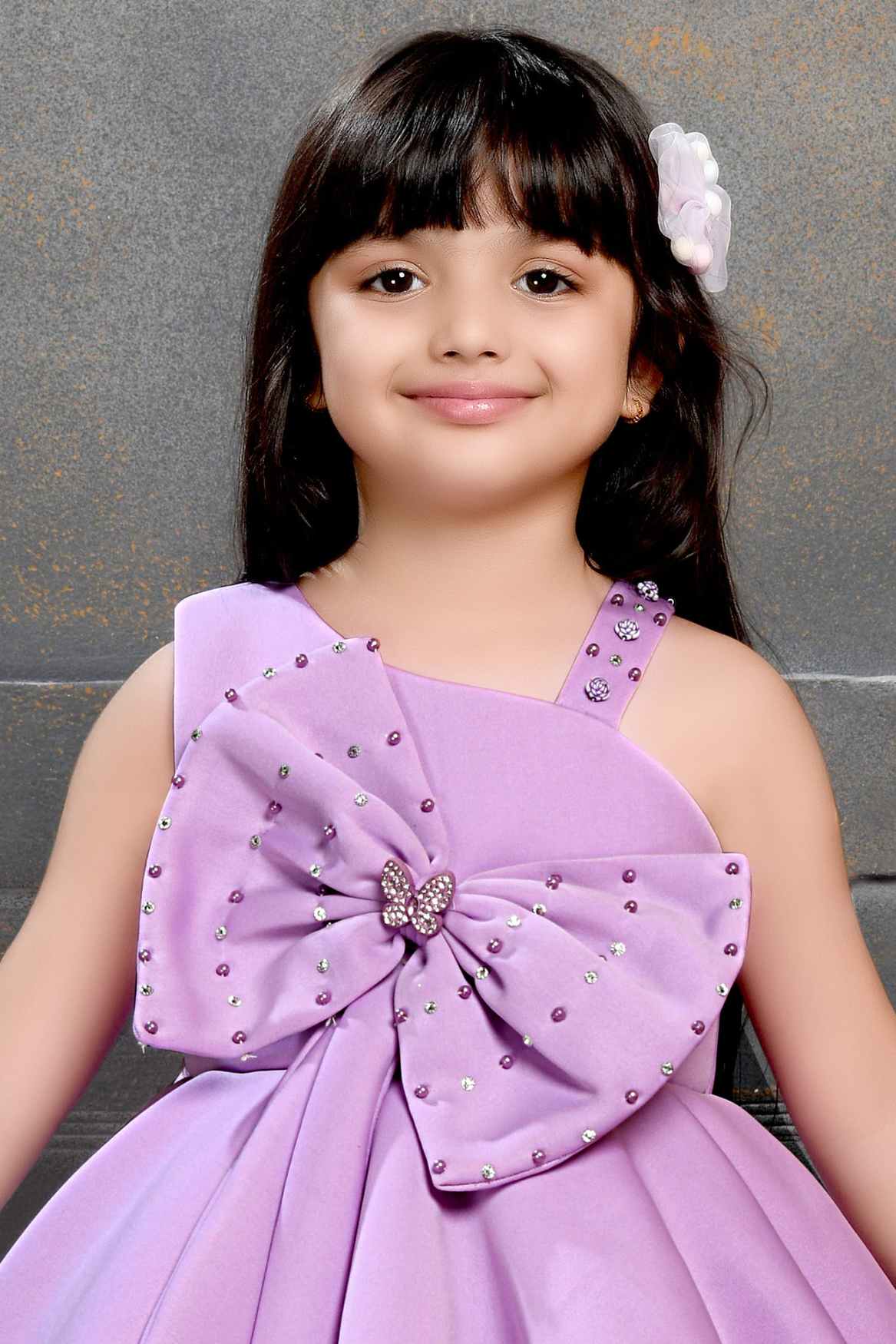 Purple Sleeveless And Bow Embellishment With Stone And Pearl Work Frock For Girls