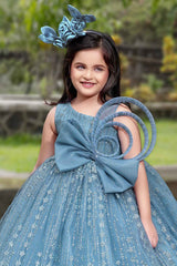 Blue Gown With Bow Embellished And Shimmer Printed For Girls