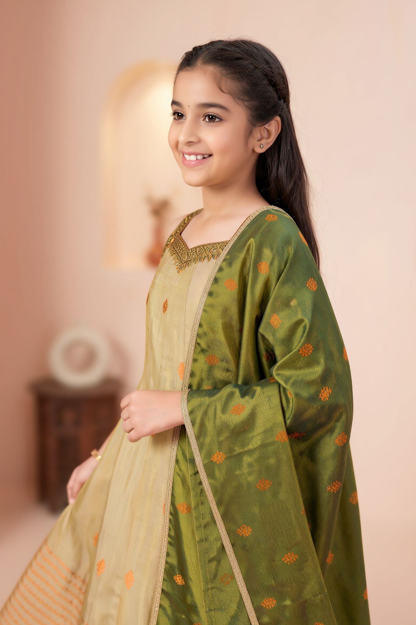 Girls Gold Silk Kurta Set with Zari Border And Green Dupatta