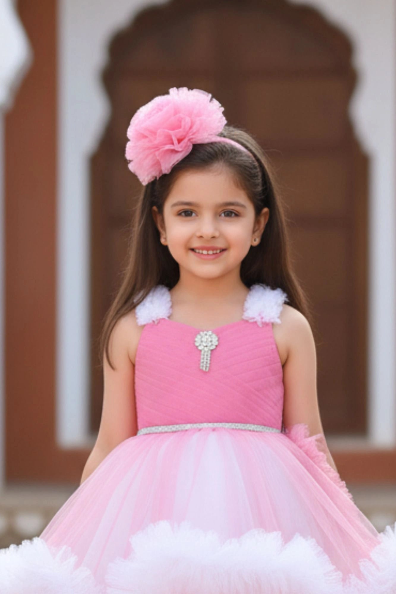Pink Ruffle Party Frock With Stone Embellished And High-Low Hem For Girls