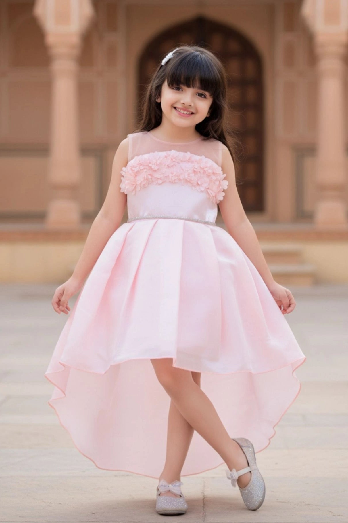 Elegant Peach Embellished High-Low Party Wear Frock with Floral Bodice For Girls