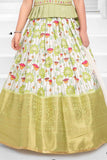 Pista And Cream Silk Pattu Pavadai With Gold Foil Print For Girls