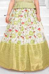 Pista And Cream Silk Pattu Pavadai With Gold Foil Print For Girls