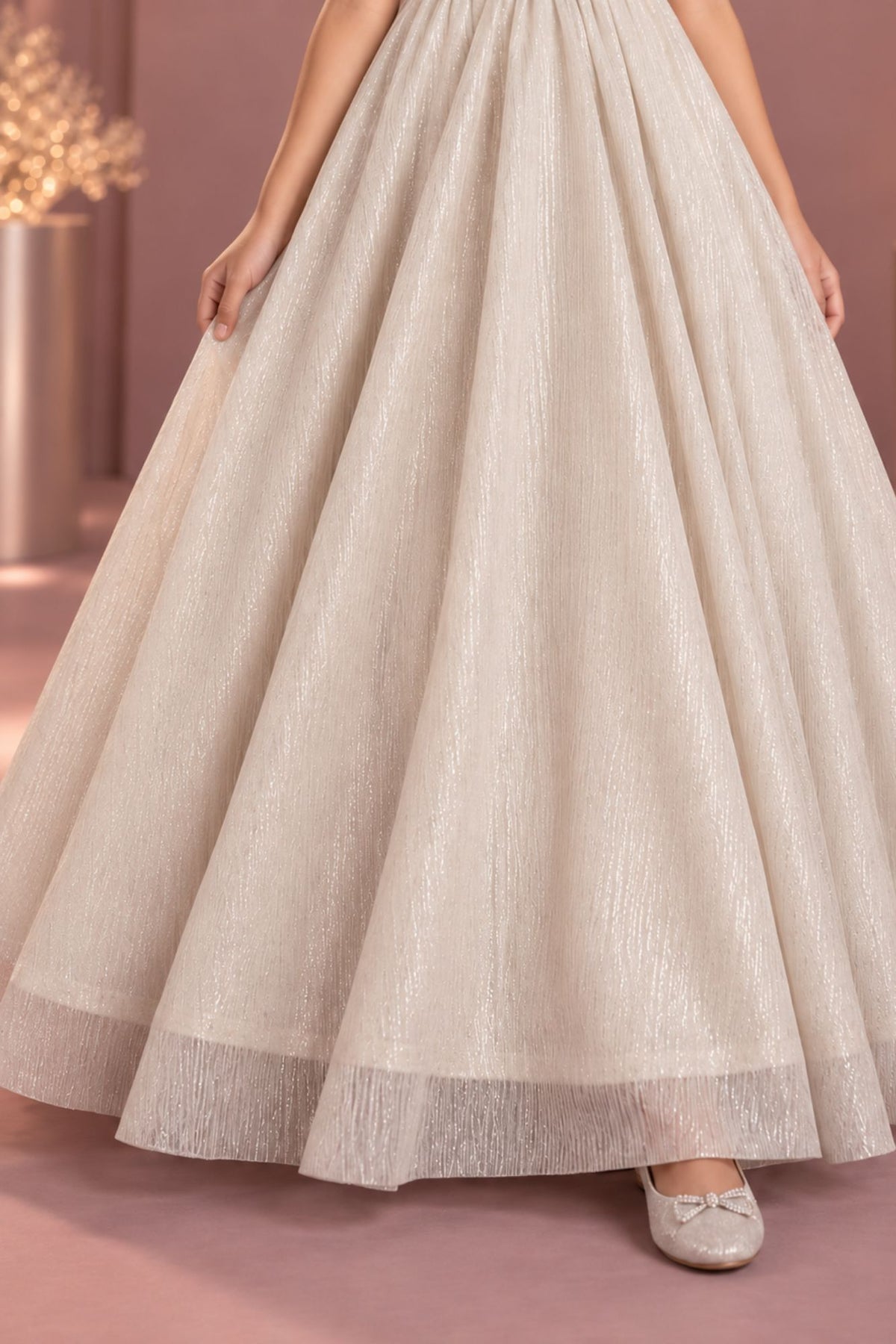 Elegant Sleeveless Cream Shimmer Party Wear Gown For Girls