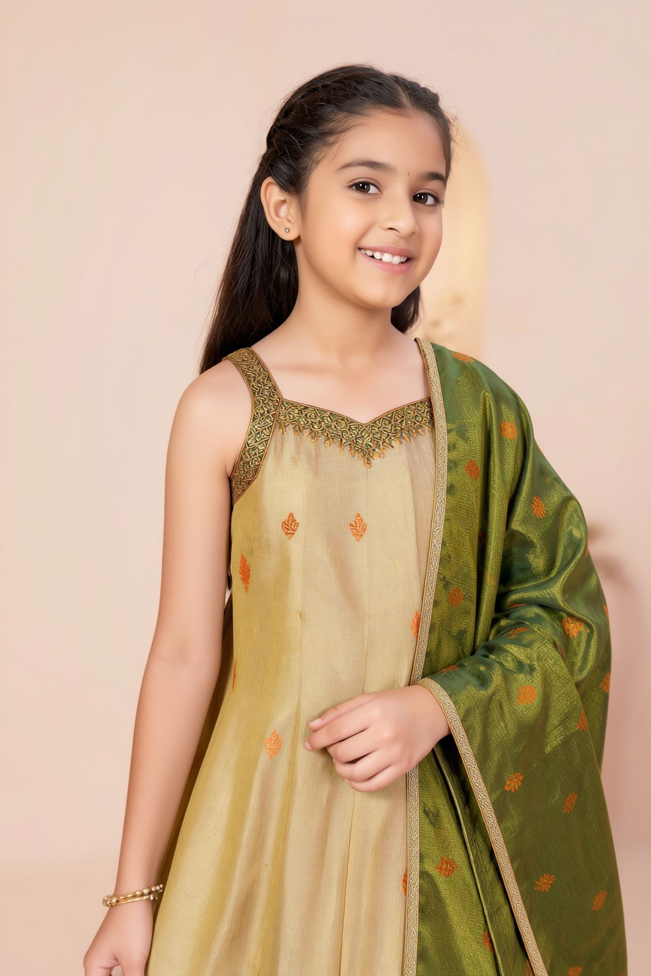 Girls Gold Silk Kurta Set with Zari Border And Green Dupatta