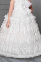 White Sequin Net Party Wear Gown Embellished With Bow For Girls