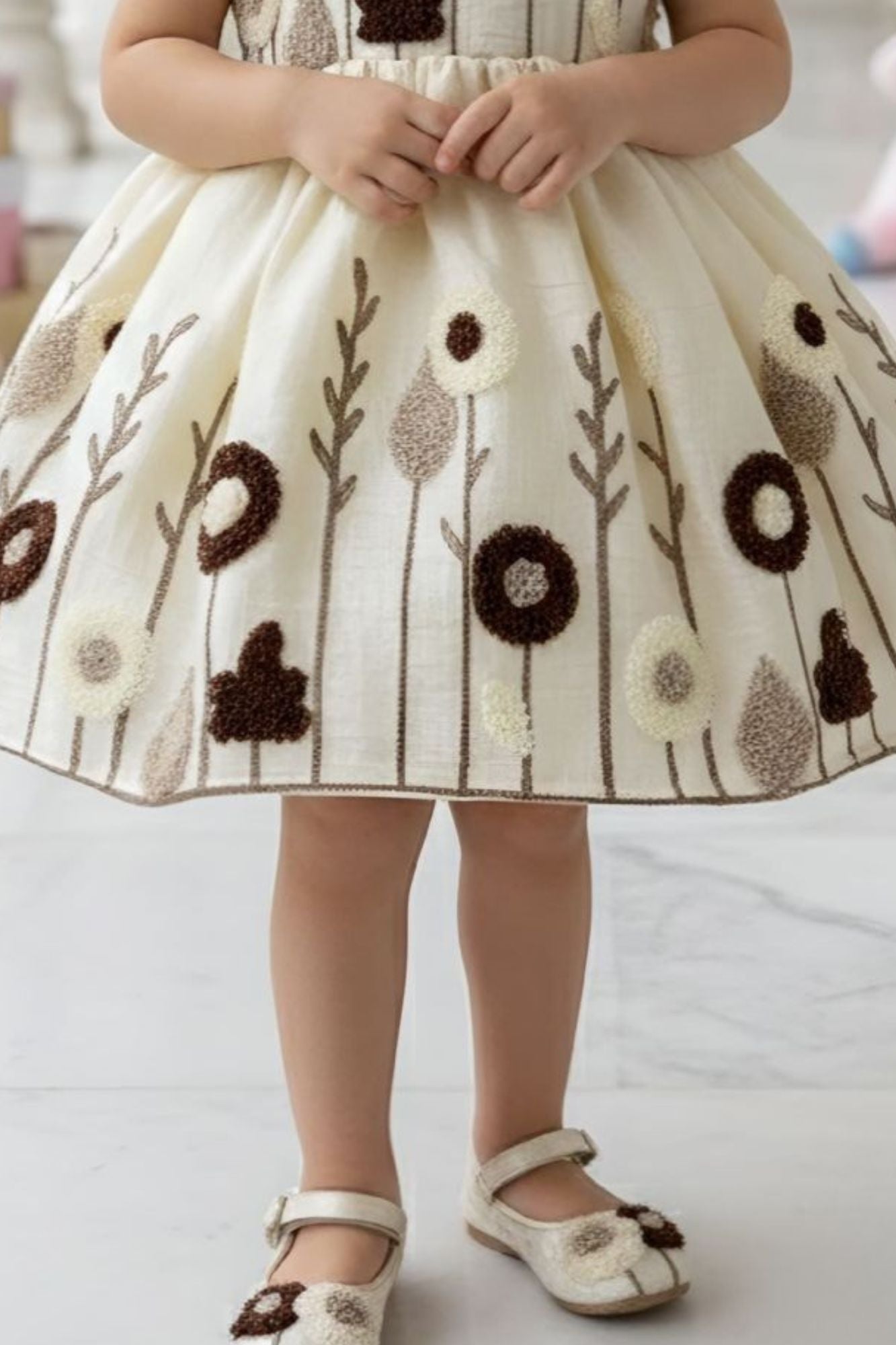 Girls Cream Embroidered Party Wear Frock with Floral Motif