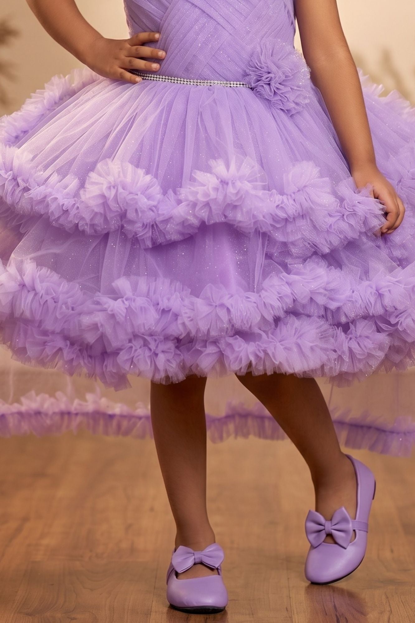 Purple Sleeveless Stone Work And Floral Embellished Tail Back Frock For Girls