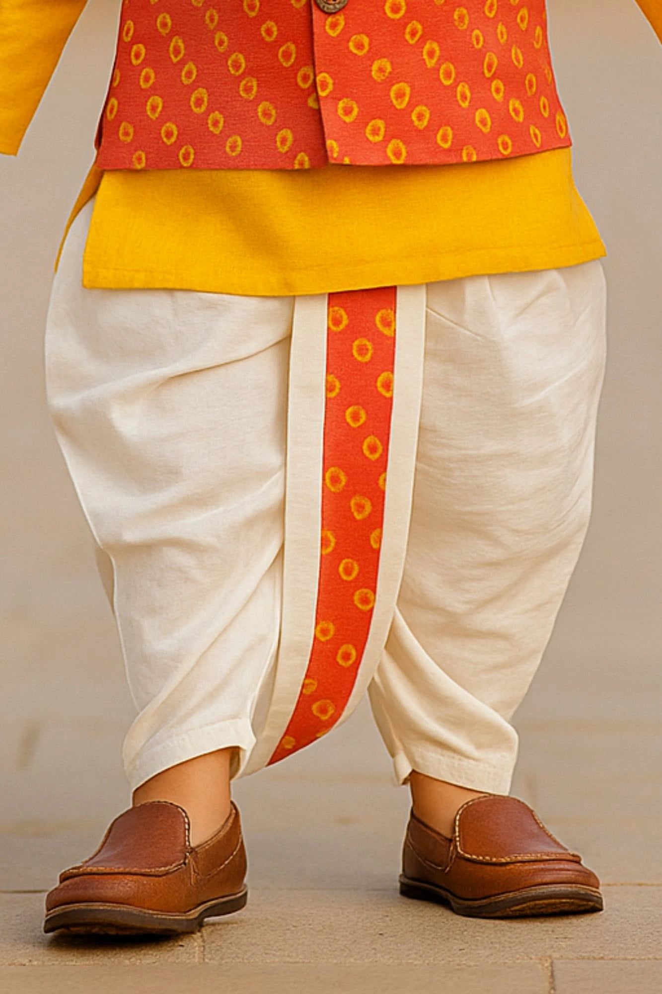 Yellow Kurta with Orange Block Printed Nehru Jacket & White Dhoti Set For Boys