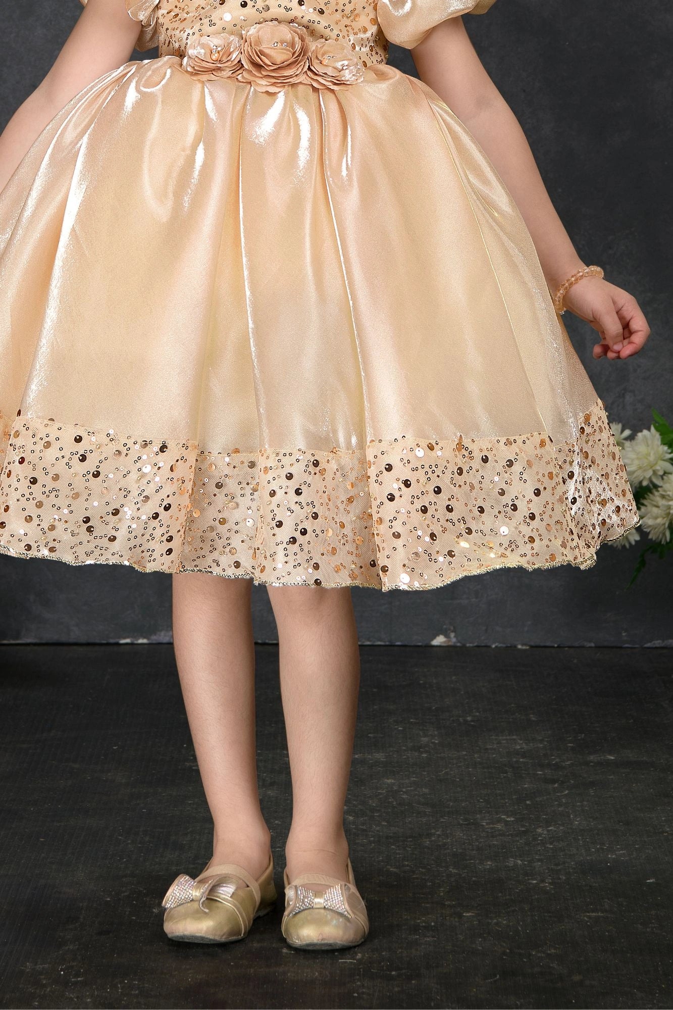 Golden Sequin Party Wear Frock with Puffy Sleeves and Floral Waist Detail For Girls