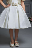Ivory Party Frock with Gold Embellished Shrug And Bow Waist Accent For Girls