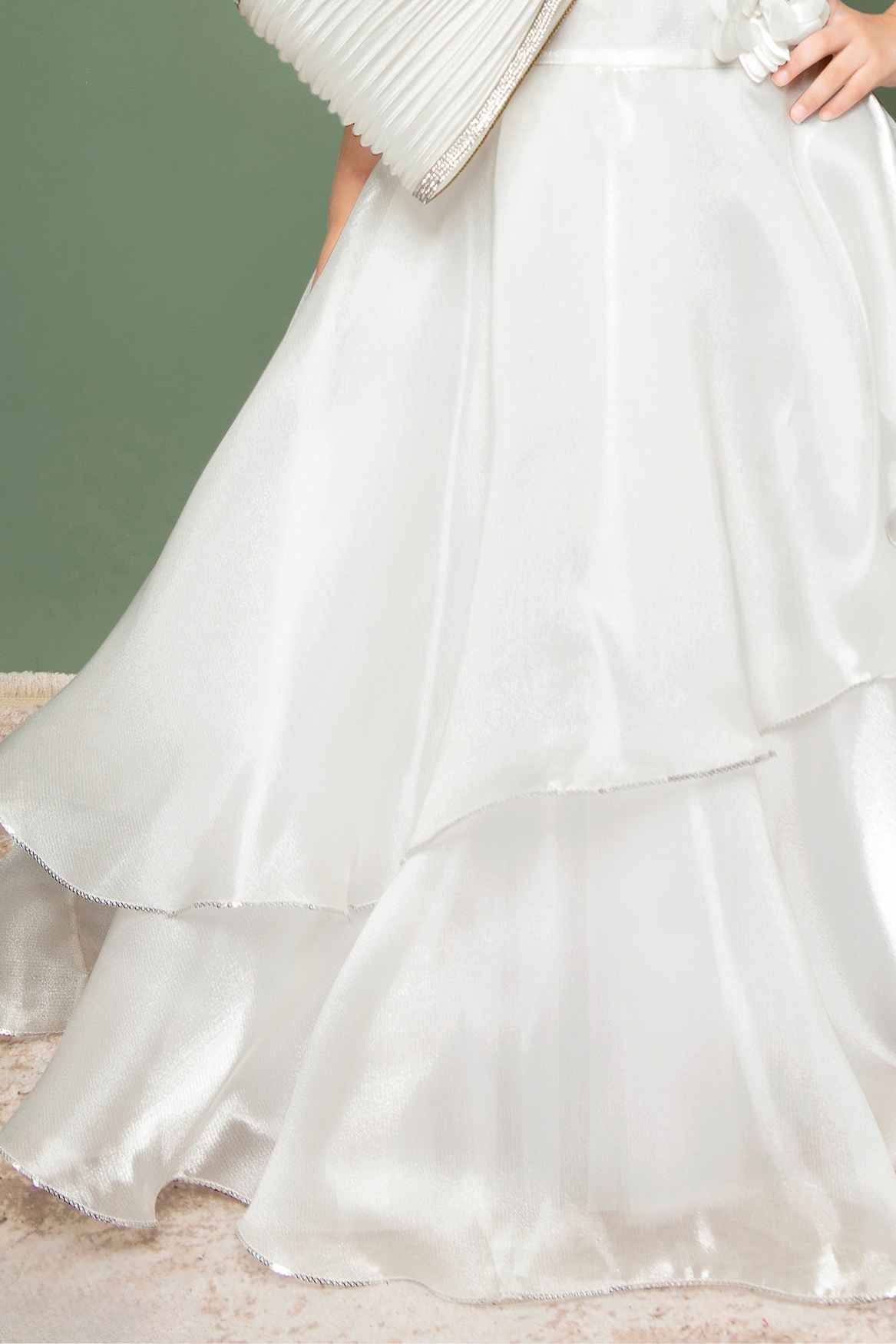White Party Wear Gown With Floral And Bow Embellishment For Girls