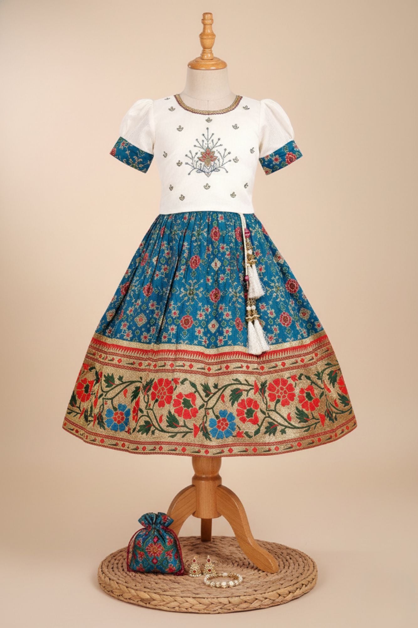 Ivory And Teal Blue Silk  Pattu Pavadai For Girls