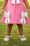 Baby Pink Party Frock with White Bow Accents For Girls