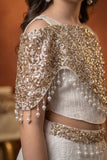 Designer Ivory Lehenga Set with Sequin Cape and Pearl Tassel Detailing For Girls