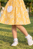 Yellow Floral Printed Dress And Matching Sling Bag For Girls