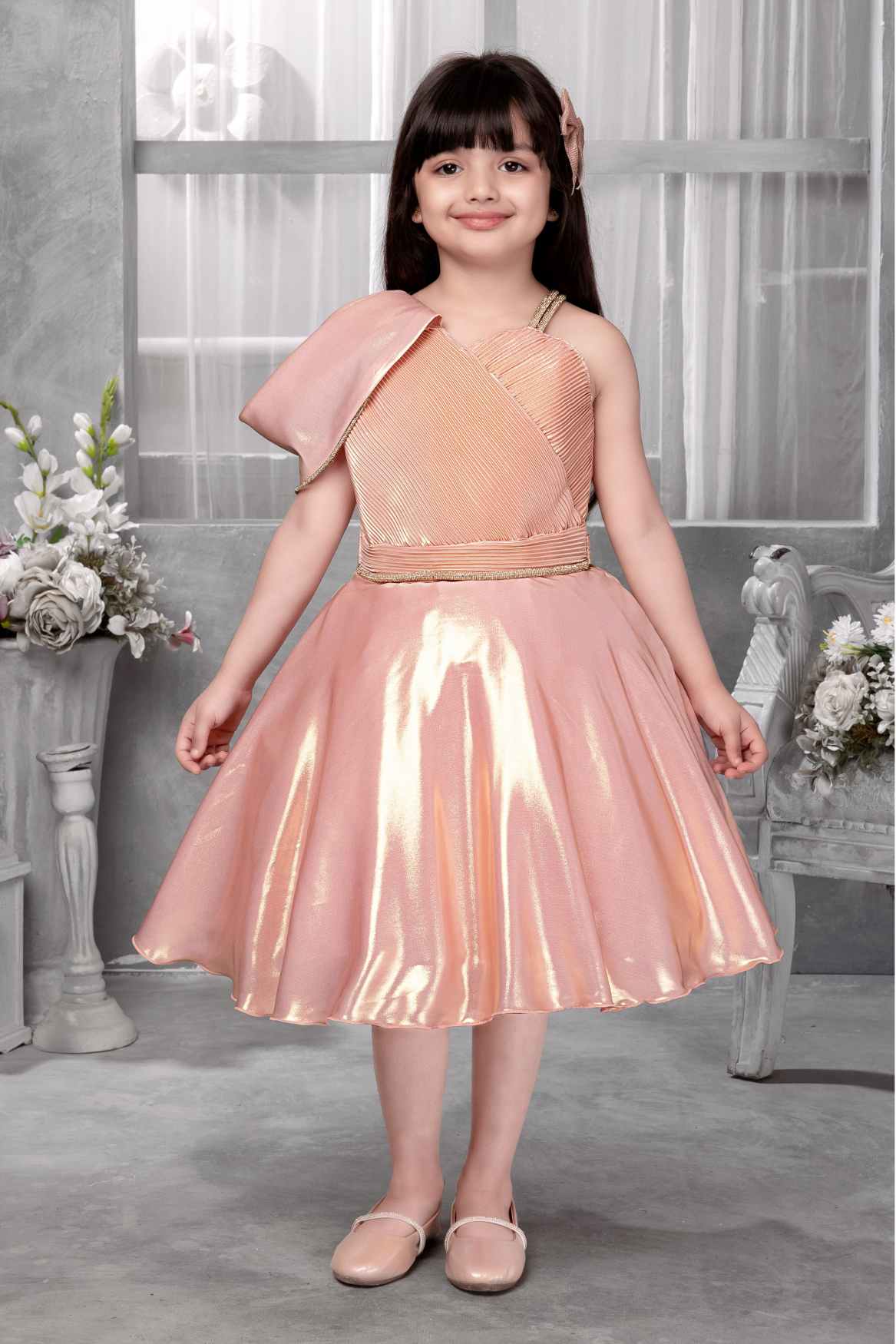 Shimmery Peach One-Shoulder Party Wear Frock With Draped Detail For Girls