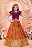 Purple And Rust Silk Pattu Pavadai with Puff Sleeves For Girls