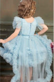 Ruffle Blue Multi-Layered Party Wear Frock With Flower Embellishment For Girls