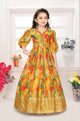 Elegant Mustard Printed Gown With Mirror Work For Girls