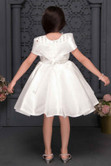 White Sequins And Pearl Work With Bow Embellished Party Wear Frock For Girls