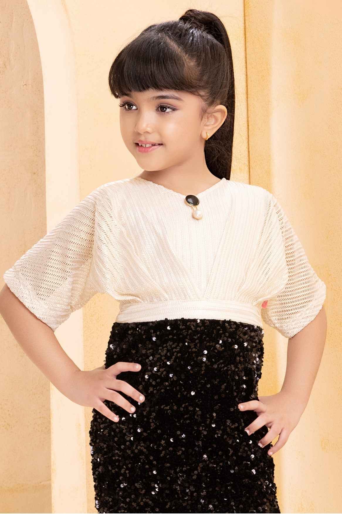 فستان حفلات أنيق من الترتر الذهبي والأسود للبنات