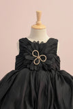 Black Party Frock with Oversized Floral Appliqué and Pleated Shine Finish For Girls
