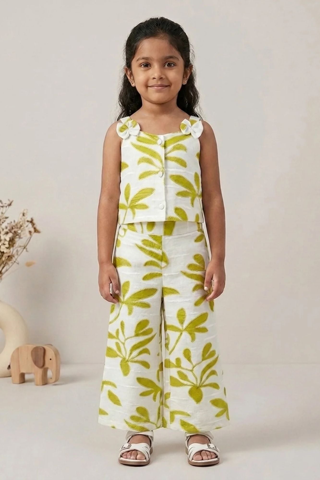 Girls White And Green Floral Printed Co-Ord Set with Sleeveless Bow Strap Top And Flared Pants