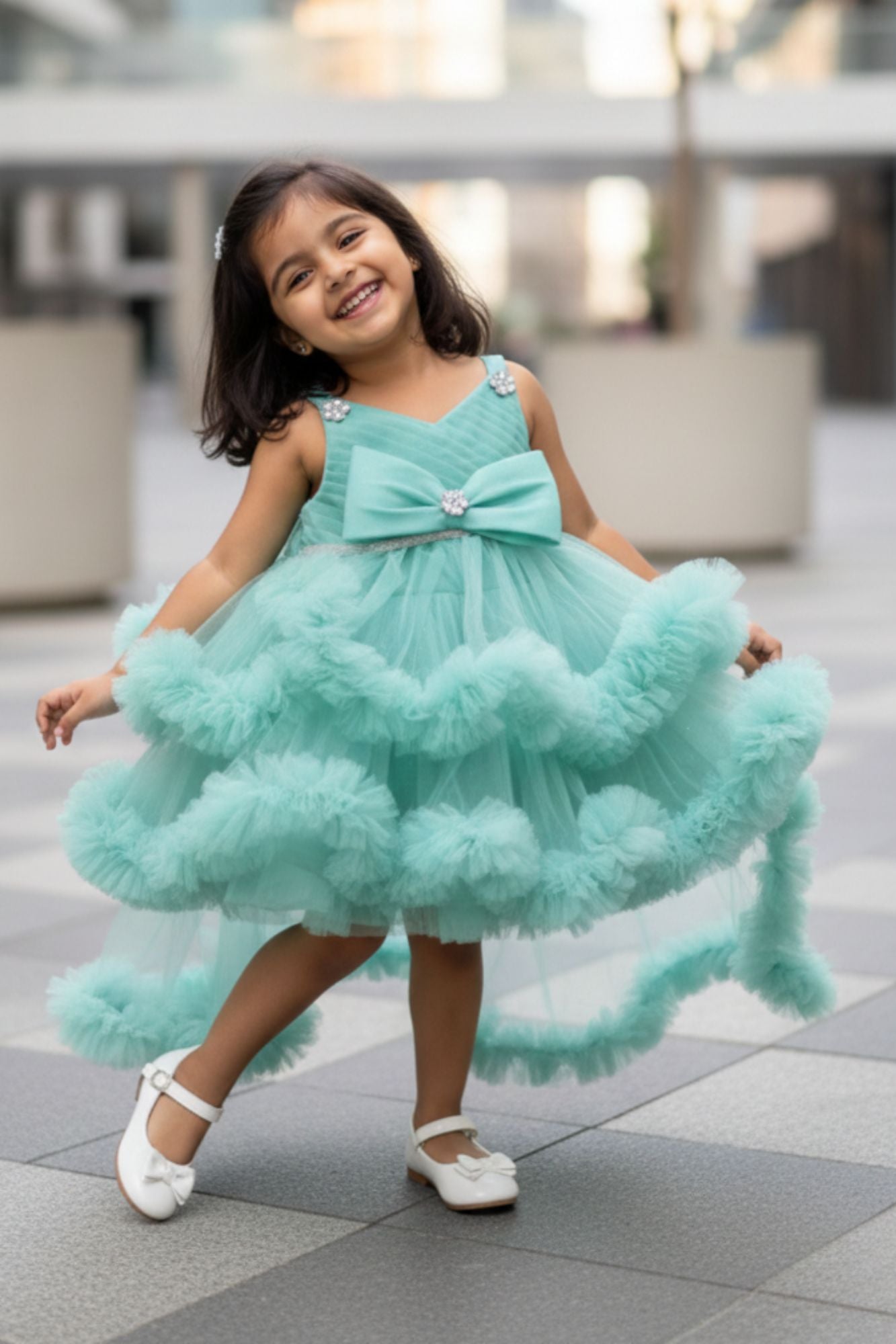 Green High-Low Party Wear Tulle Frock with Bow Detail For Girls