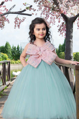 Designer Green Gown Embellished With Peach Bow