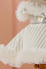 White Ruffled Frock With Golden Stripes For Girls